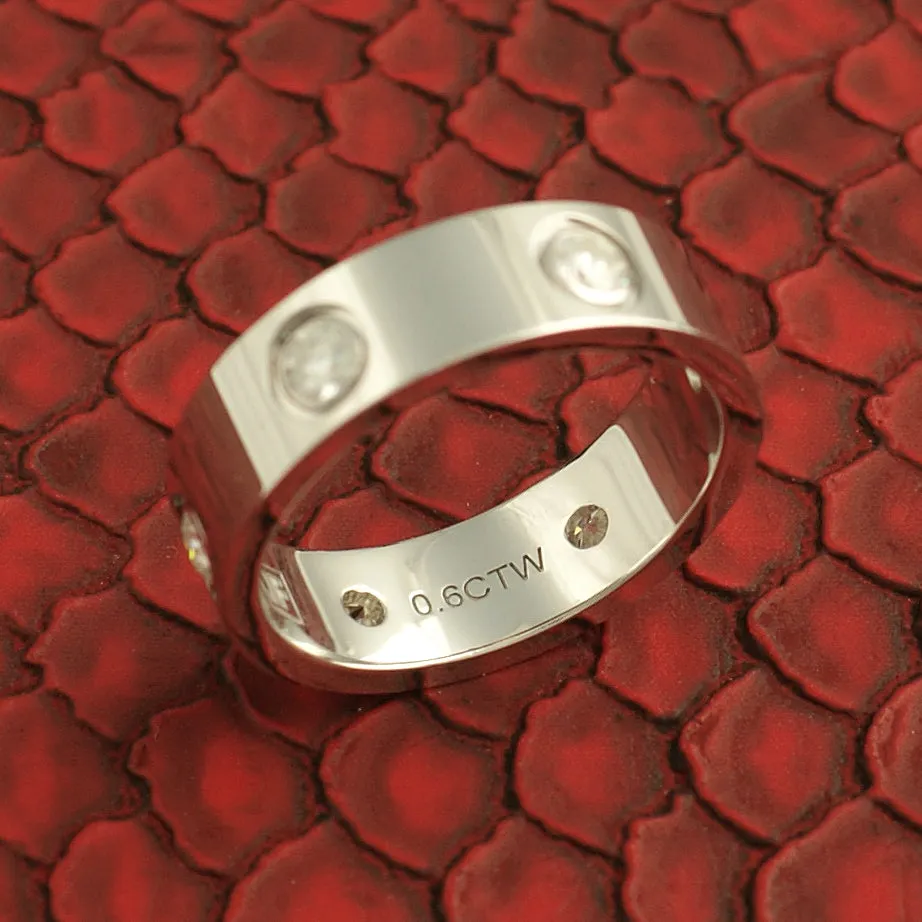 0.60 CTW Certified VVS1 Moissanite Designer Ring