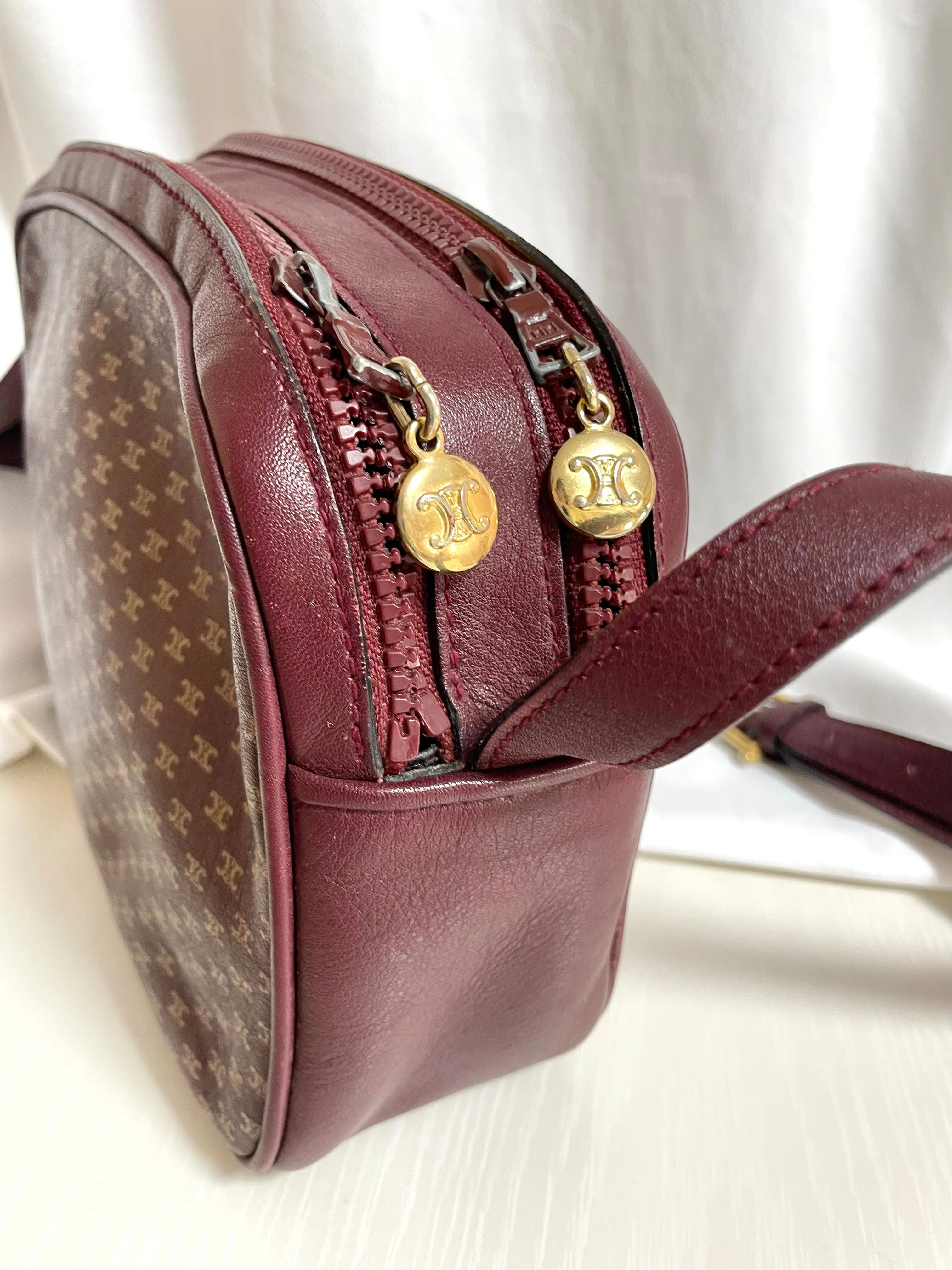 1980s. vintage Celine shoulder purse in bordeaux, burgundy leather with iconic blaison macadam print all over. riri zipper. 0411102