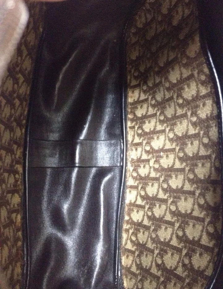 70's vintage Christian Dior brown trotter jacquard handbag with the gold tone large CD motif. ECLAIR zippers. Unisex