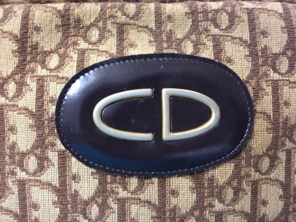 70's vintage Christian Dior brown trotter jacquard handbag with the gold tone large CD motif. ECLAIR zippers. Unisex