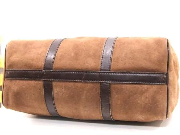 80's vintage Christian Dior Bagages genuine brown suede leather travel duffle bag, purse with embossed Dior logo allover. Unisex luggage