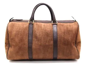 80's vintage Christian Dior Bagages genuine brown suede leather travel duffle bag, purse with embossed Dior logo allover. Unisex luggage