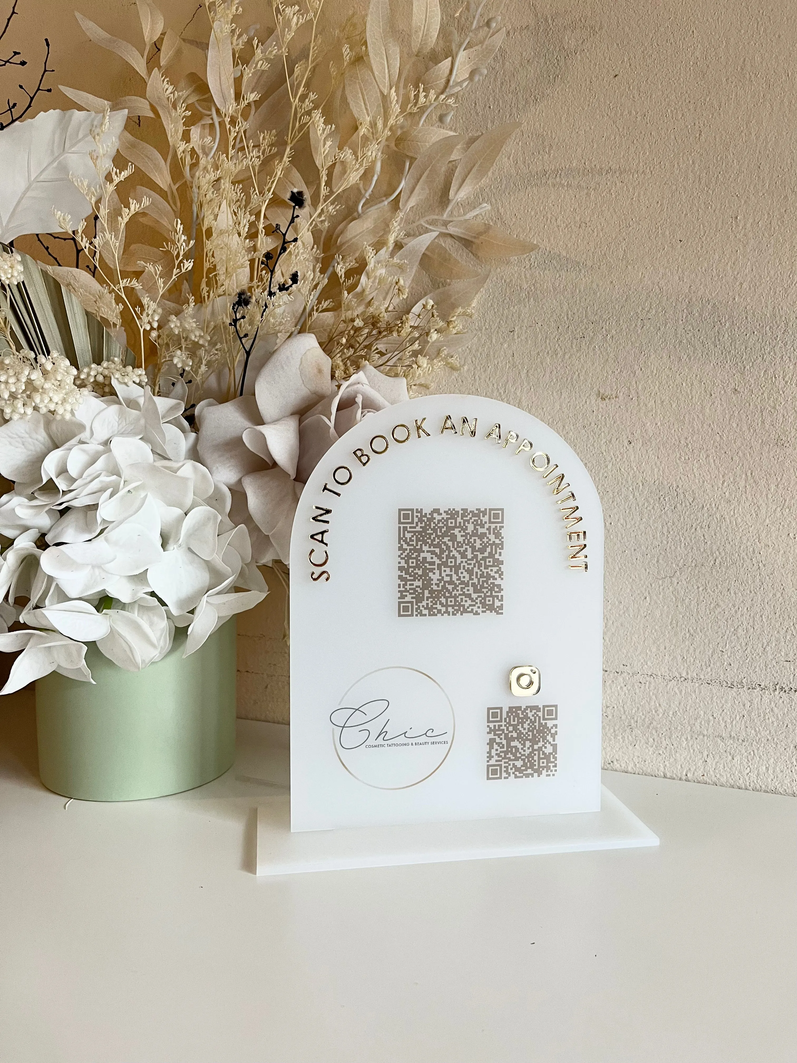 Book an appointment   Logo and 1 x QR