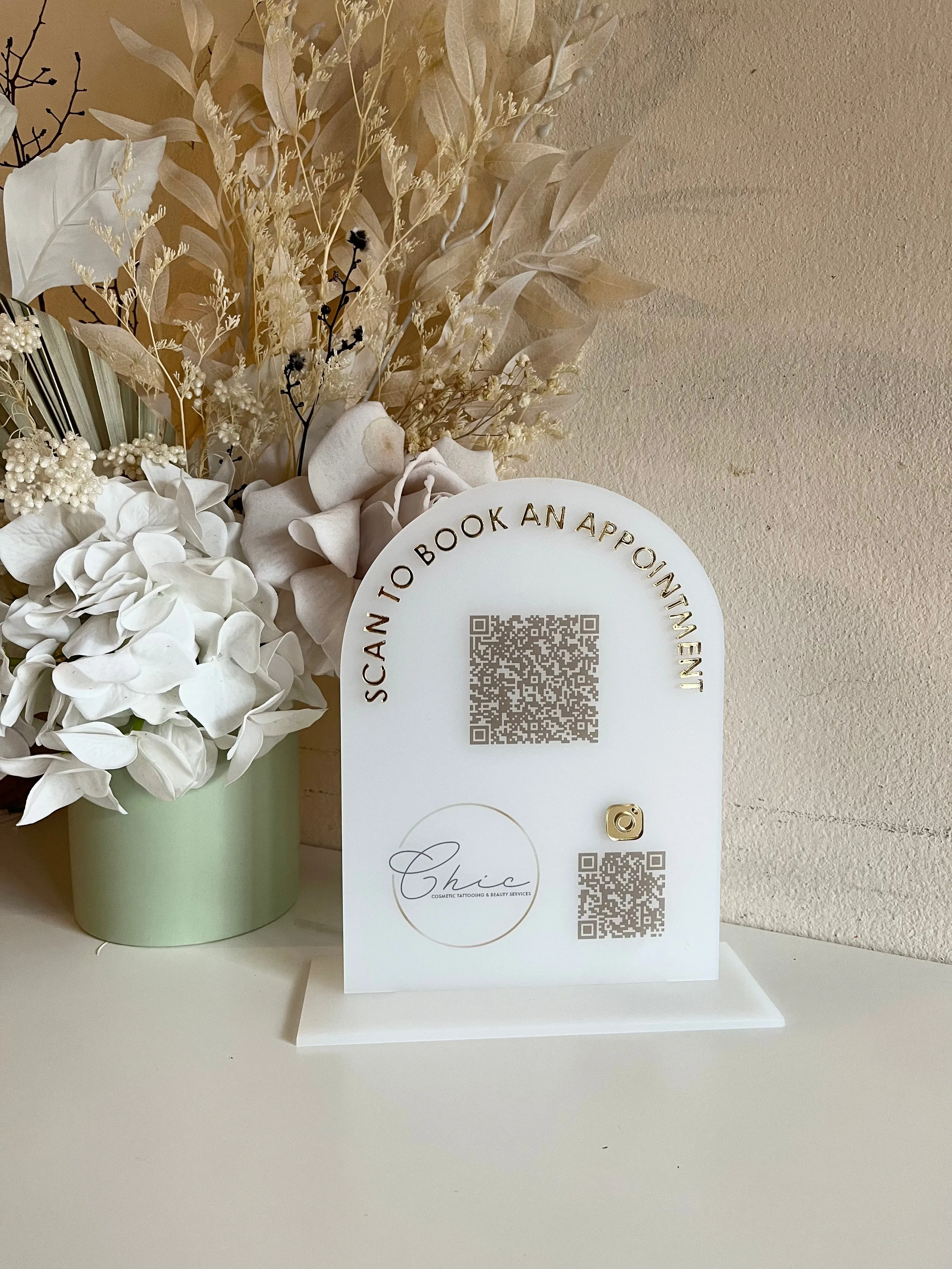 Book an appointment   Logo and 1 x QR