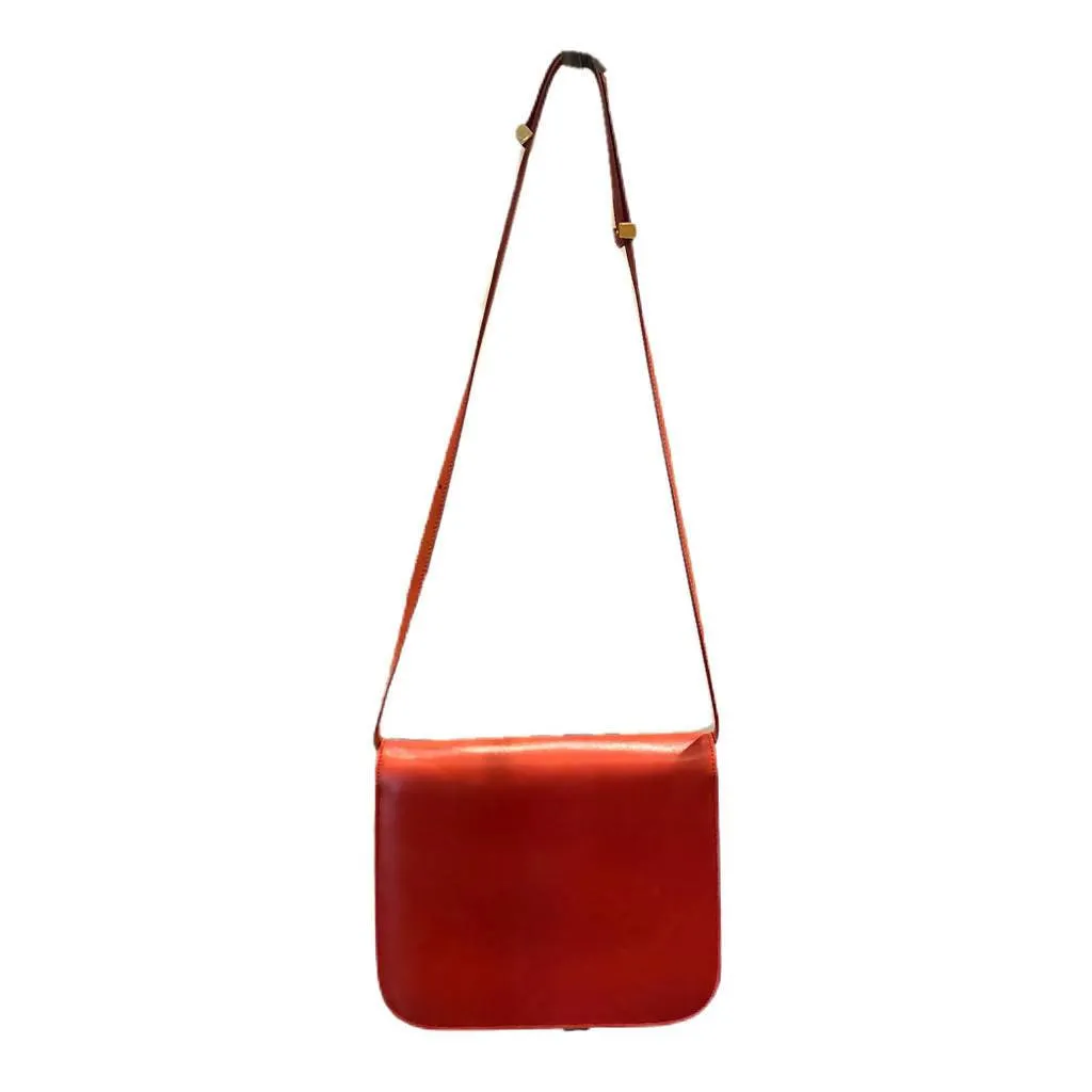 CELINE Red Handbag with Gold Detail