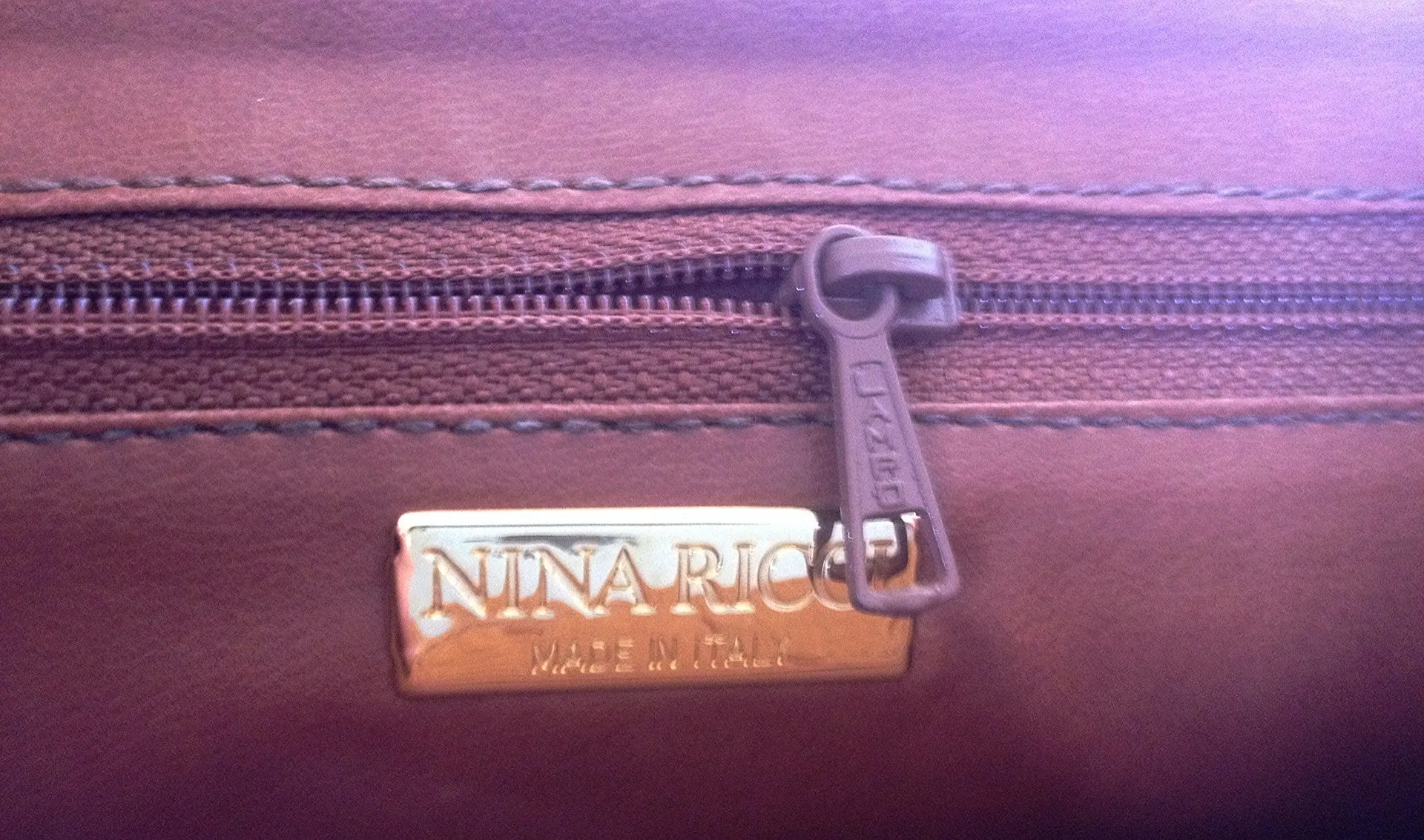 MINT. Vintage Nina Ricci tan brown ostrich-embossed leather handbag purse with golden motif at closure. Masterpiece by Maroquinerie