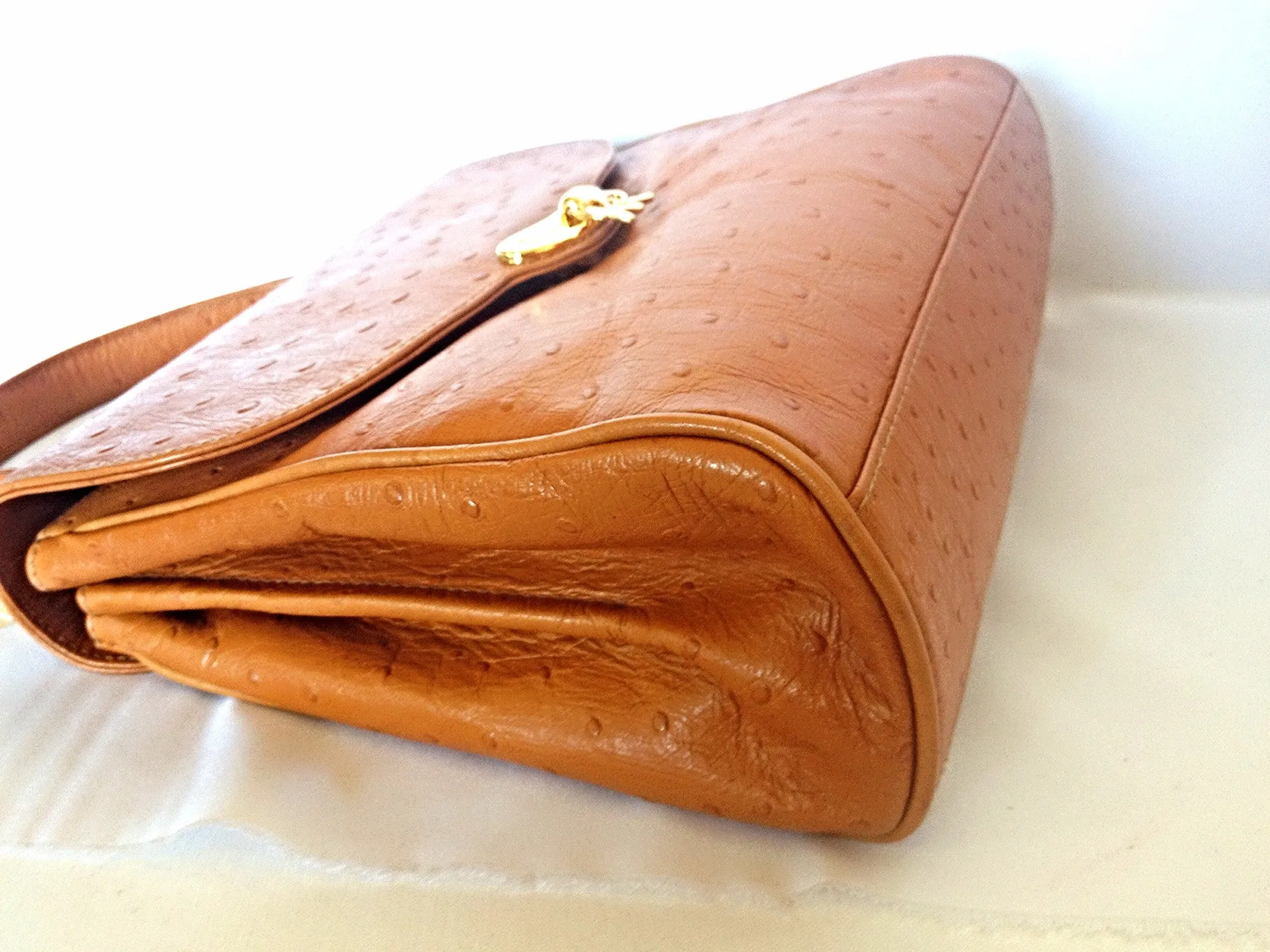 MINT. Vintage Nina Ricci tan brown ostrich-embossed leather handbag purse with golden motif at closure. Masterpiece by Maroquinerie