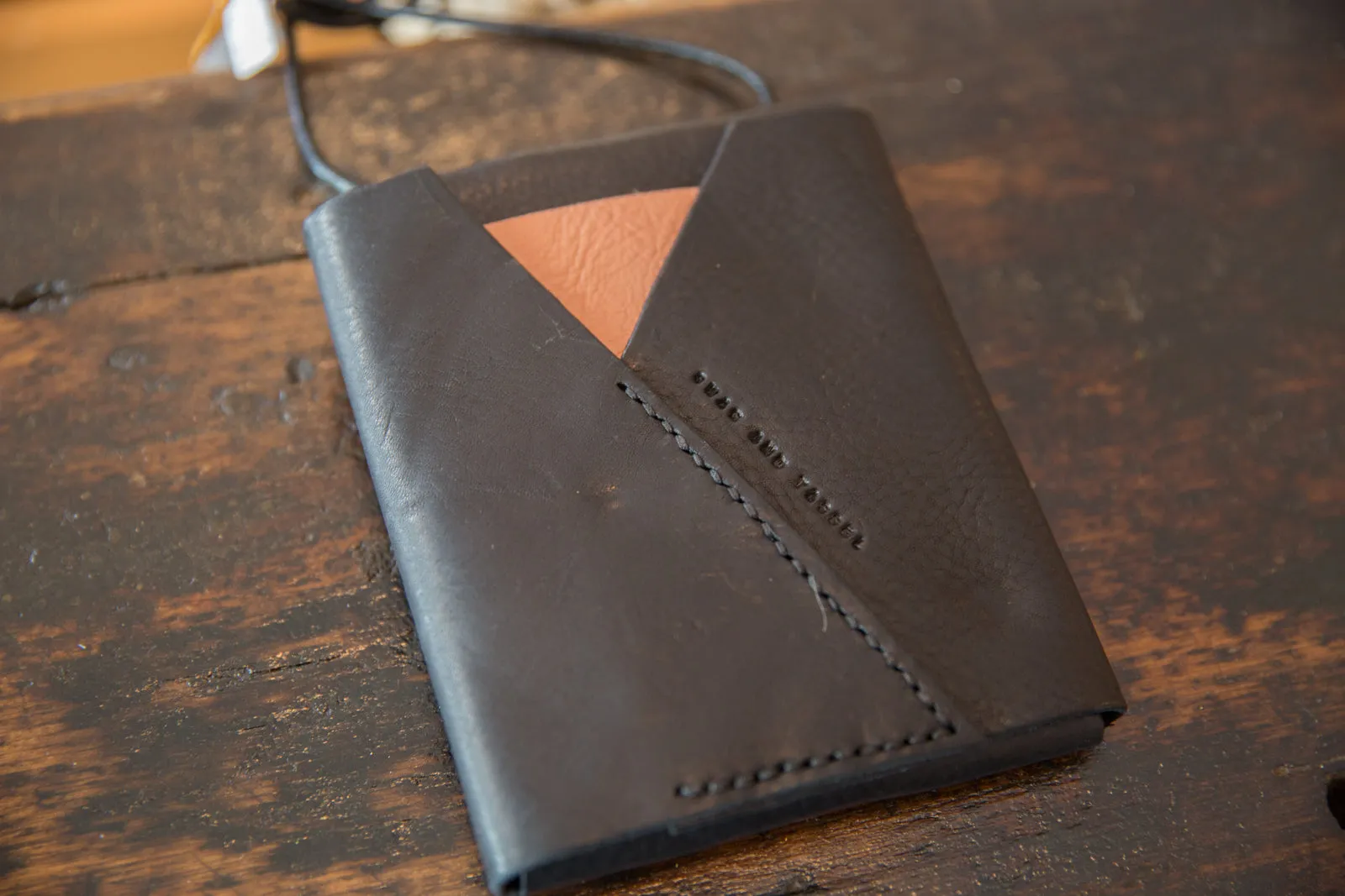 Rug Fragment and Leather Shoulder Bag
