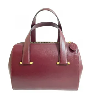 Vintage Cartier classic wine, bordeaux leather handbag purse with bullet design gold hardware at handles. Must de Cartier. 0408171
