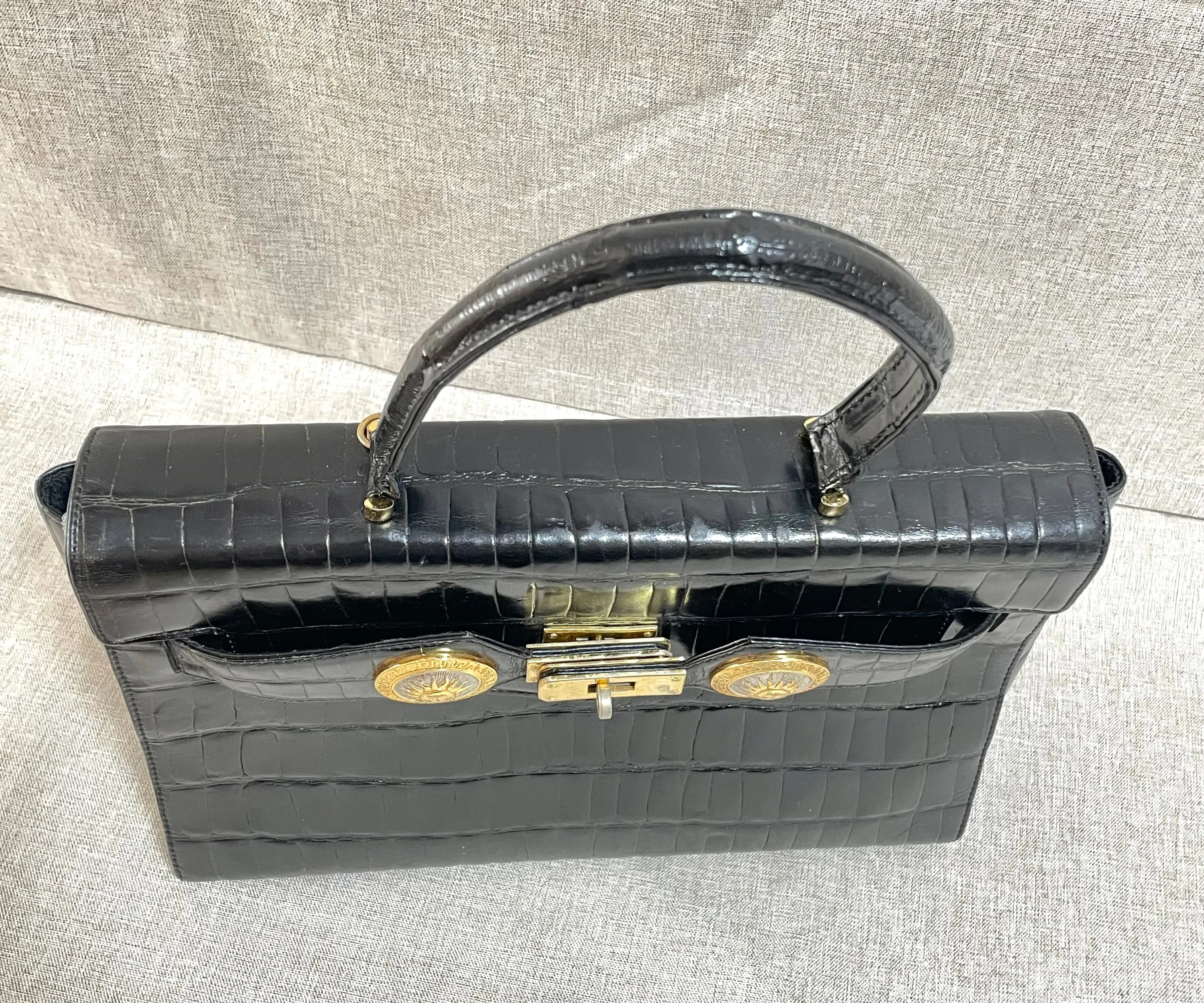Vintage Gianni Versace black croc embossed leather handbag with Medallion Sunburst charms. Gorgeous masterpiece. 061104y1