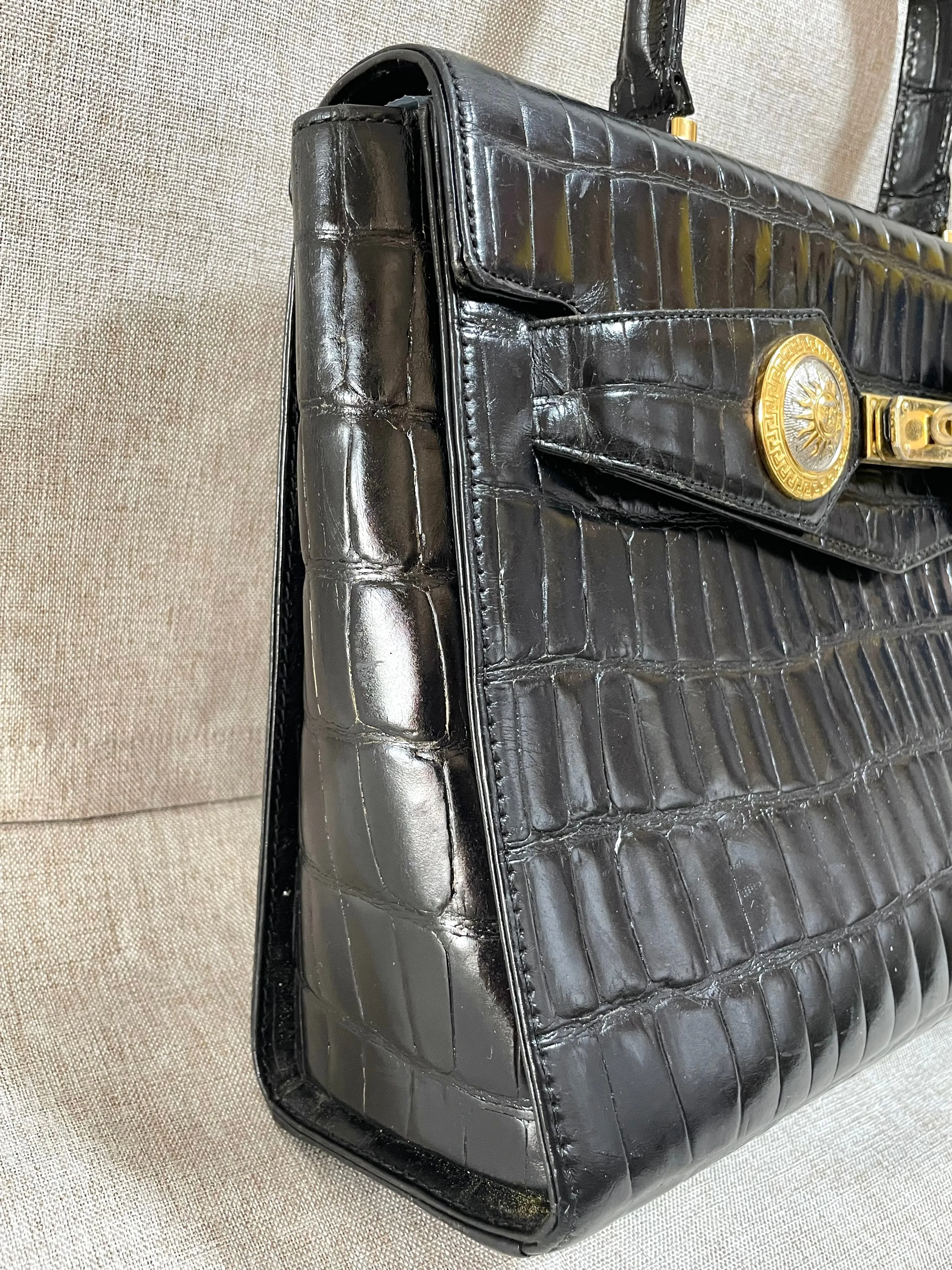 Vintage Gianni Versace black croc embossed leather handbag with Medallion Sunburst charms. Gorgeous masterpiece. 061104y1
