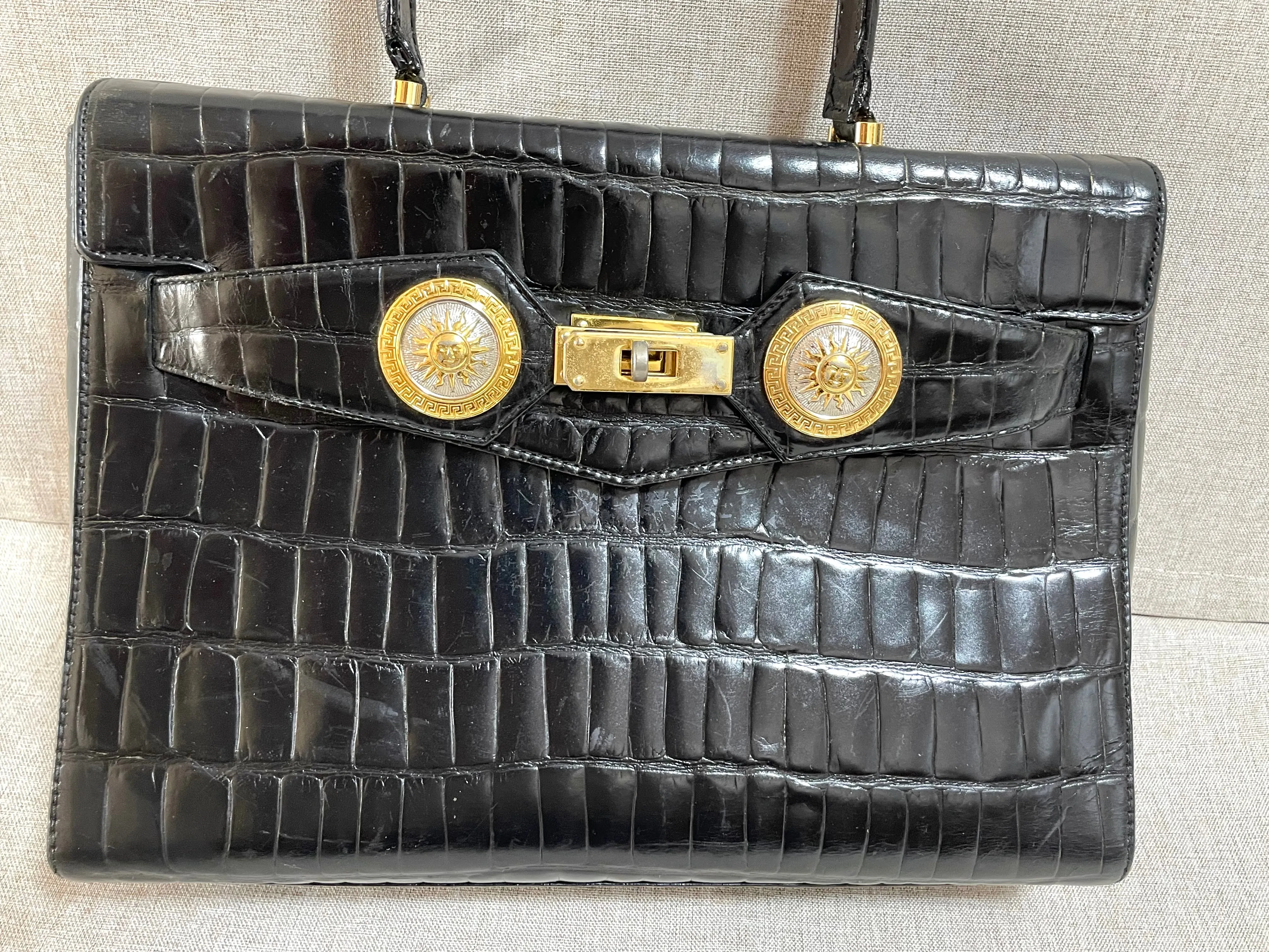 Vintage Gianni Versace black croc embossed leather handbag with Medallion Sunburst charms. Gorgeous masterpiece. 061104y1