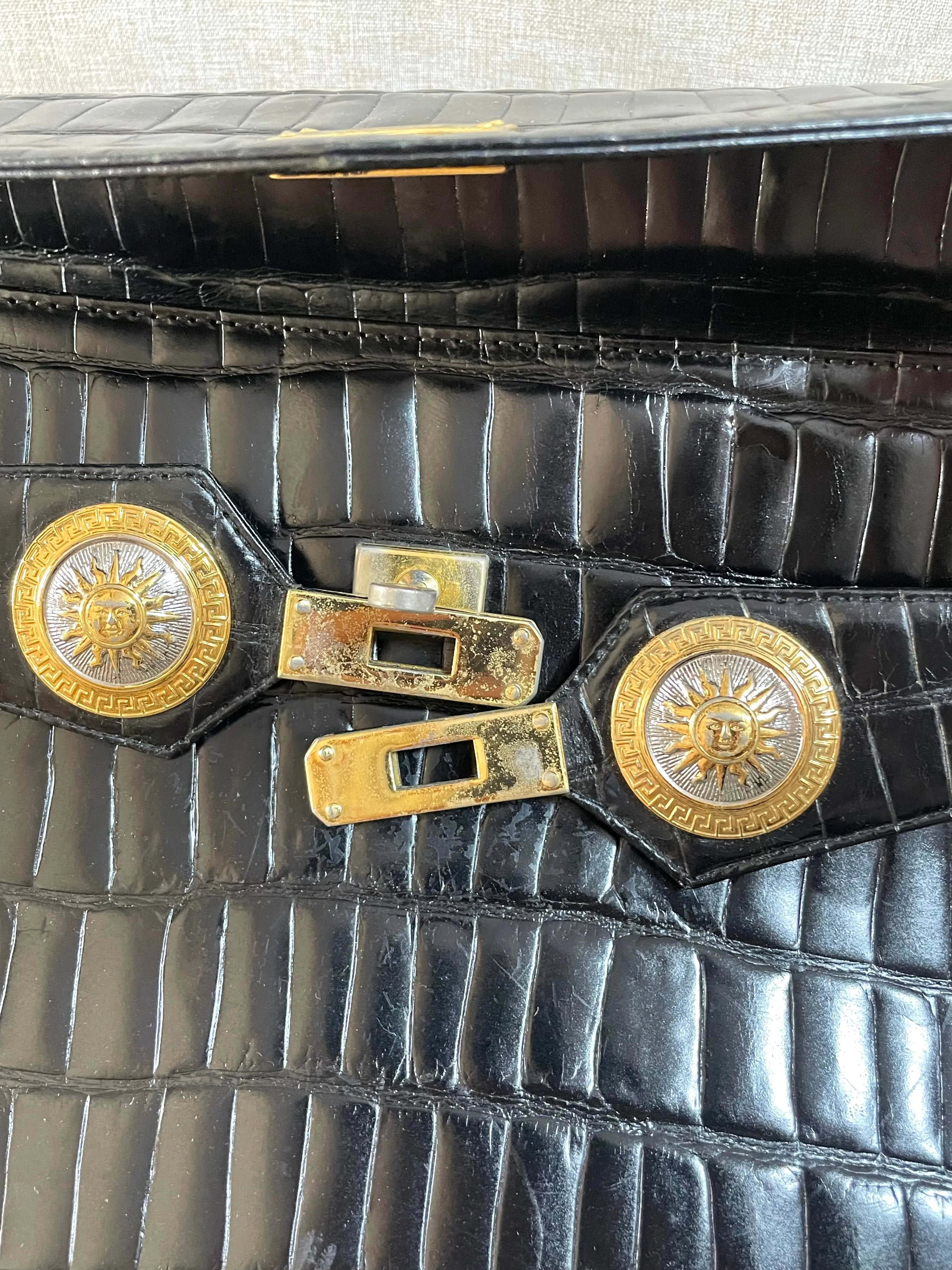 Vintage Gianni Versace black croc embossed leather handbag with Medallion Sunburst charms. Gorgeous masterpiece. 061104y1
