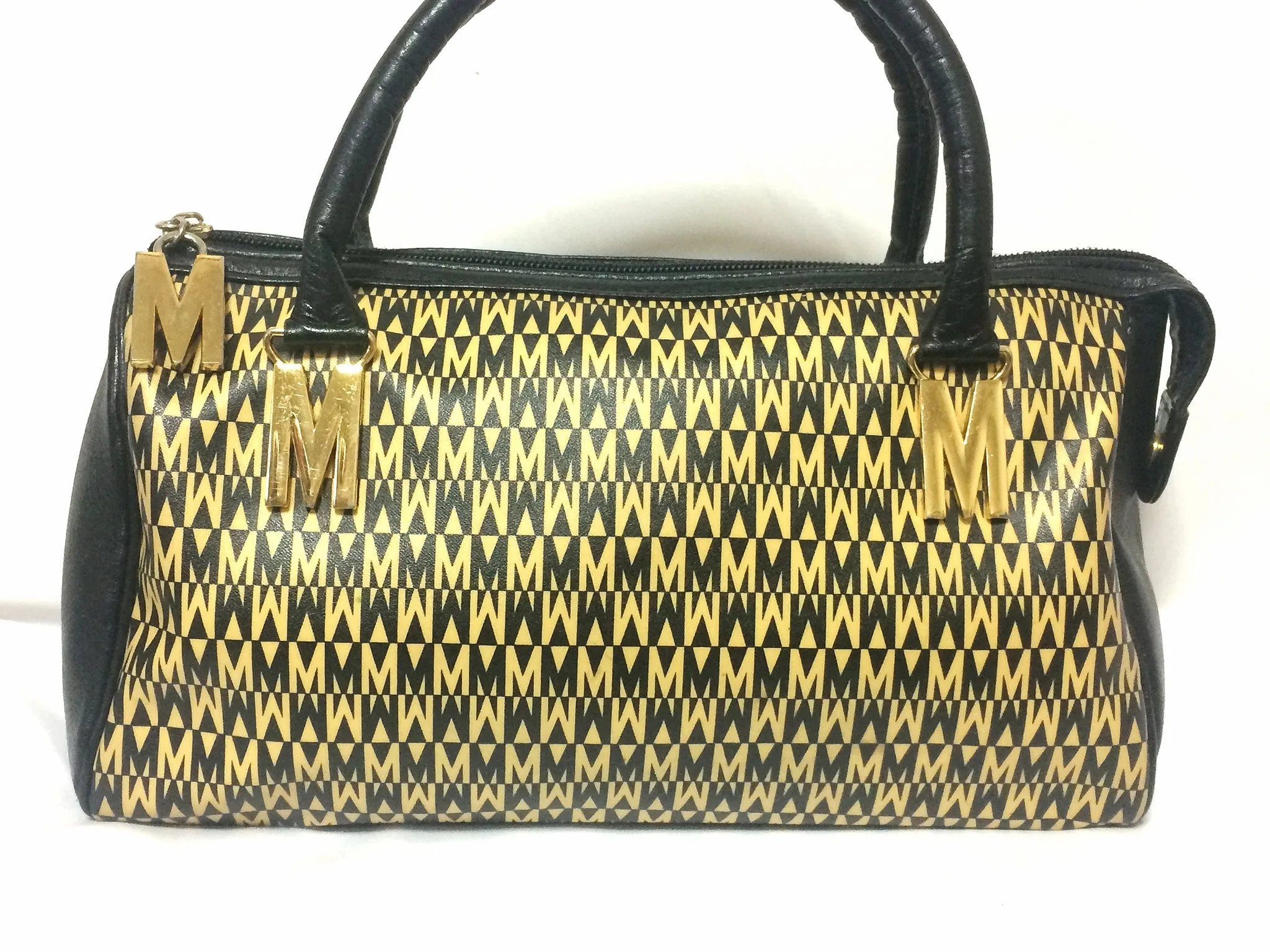 Vintage MOSCHINO black and ivory beige logo M print handbag, mini duffle bag with leather trimmings and golden M charms. 060521re1