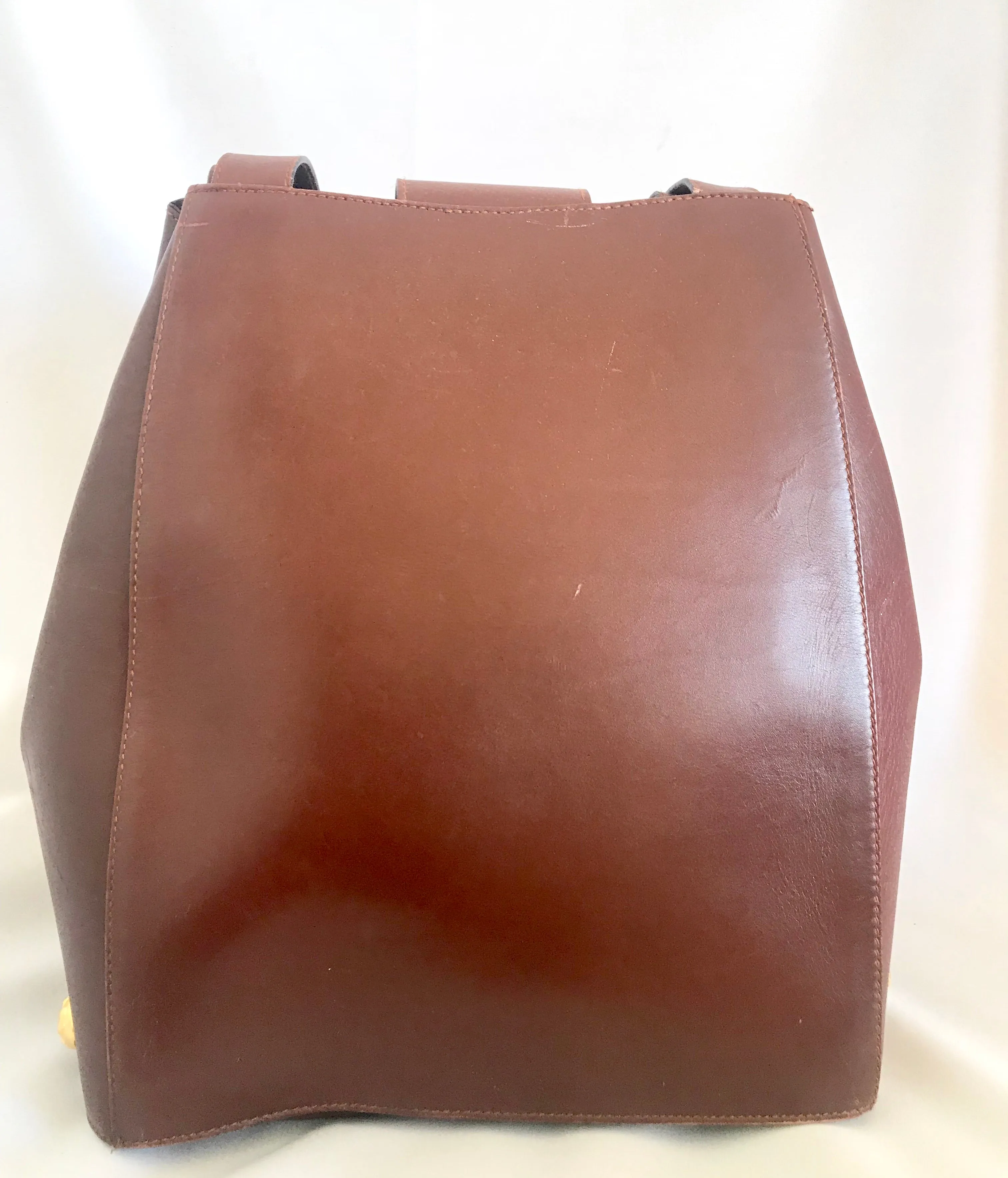Vintage Salvatore Ferragamo brown leather purse with gold tone elegant closure. Featuring Ferragamo charms. 060516re4