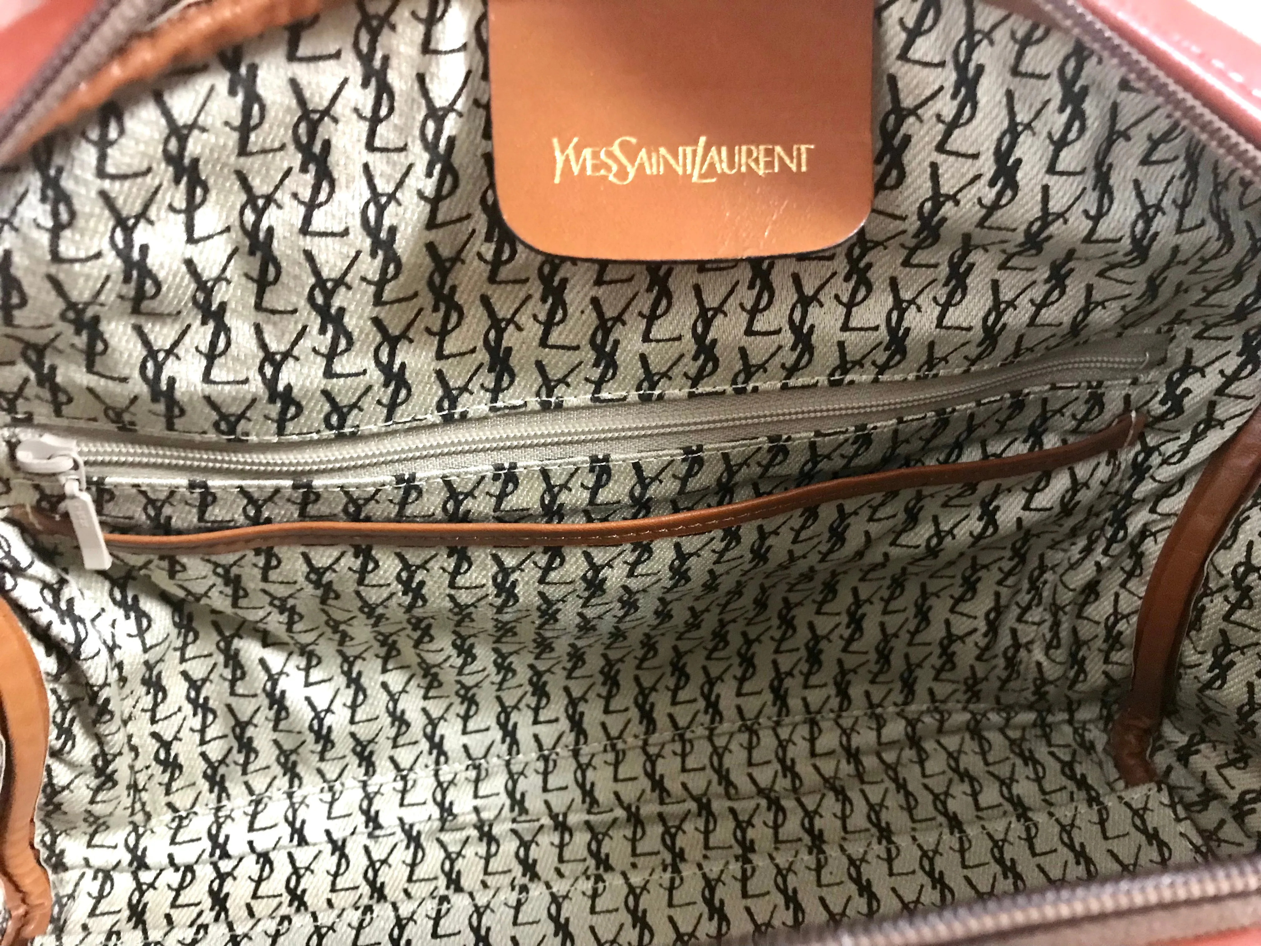 Vintage Yves Saint Laurent brown leather handbag with YSL marks. Classic unisex use bag, speedy bag.