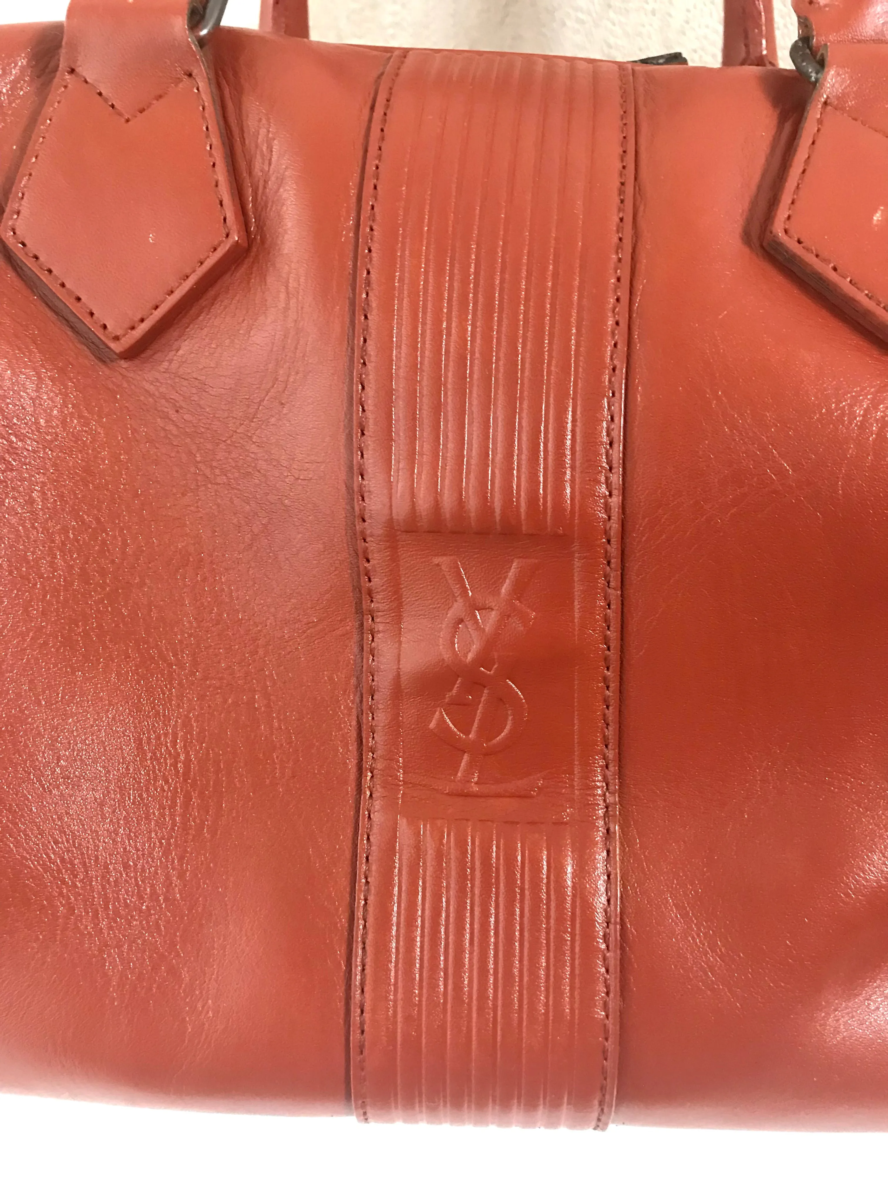 Vintage Yves Saint Laurent brown leather handbag with YSL marks. Classic unisex use bag, speedy bag.